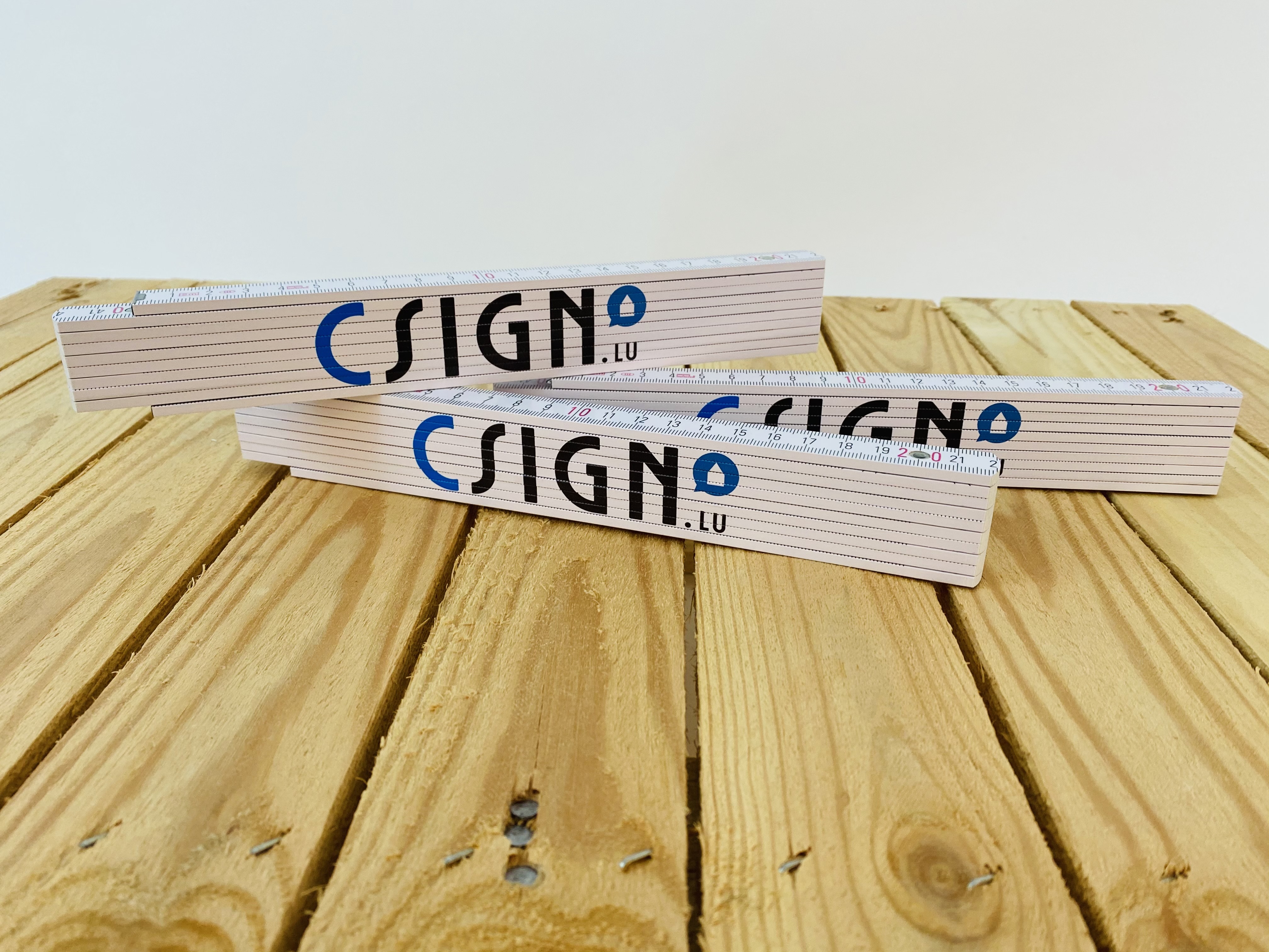metre en bois publicitaire